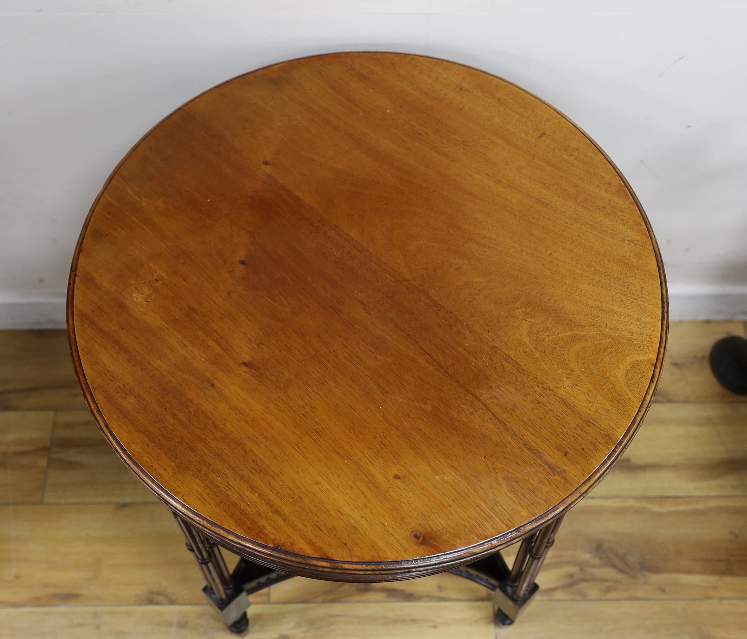 An Edwardian circular two tier centre table, diameter 61cm, height 69cm